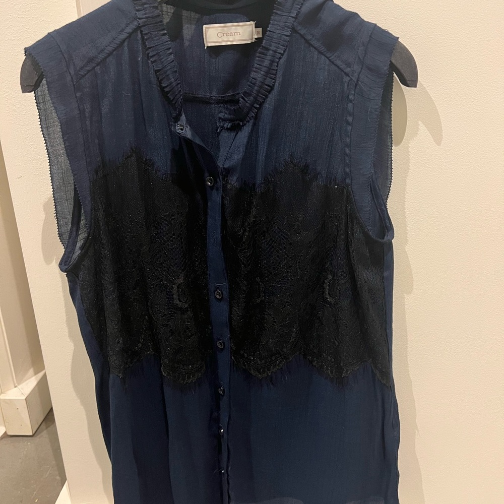 Cream, sheer navy blue with black lace detail . Short sleeve small